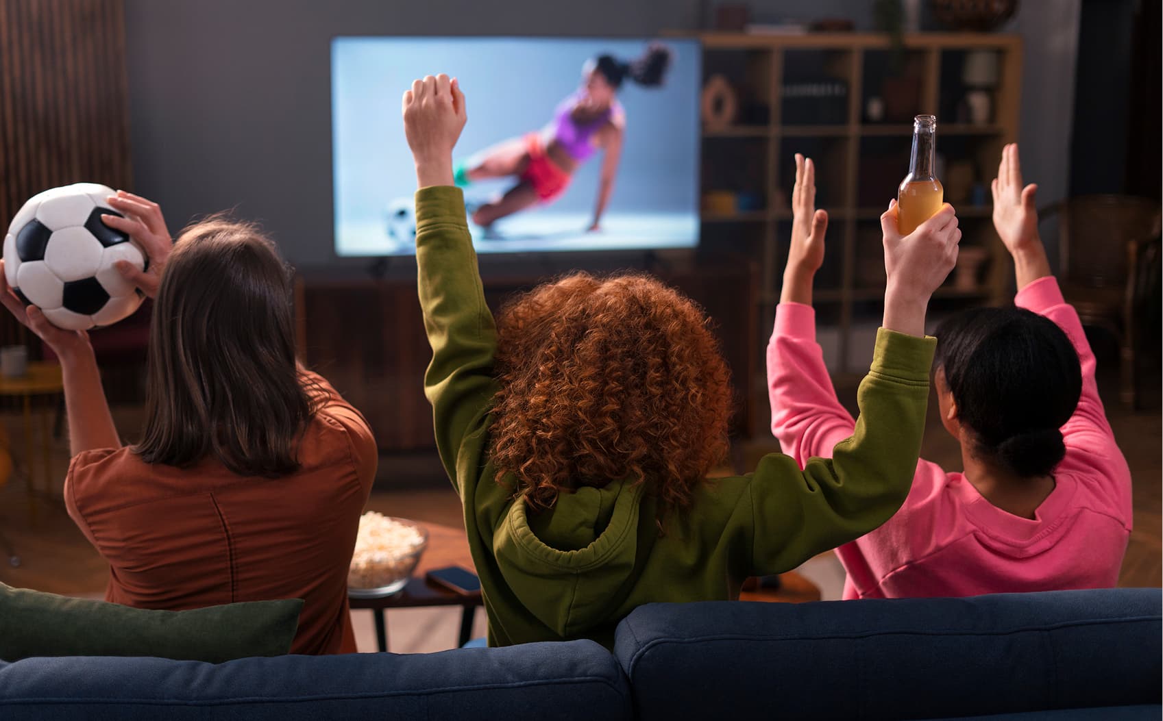 Family watching sports on Digital IPTV